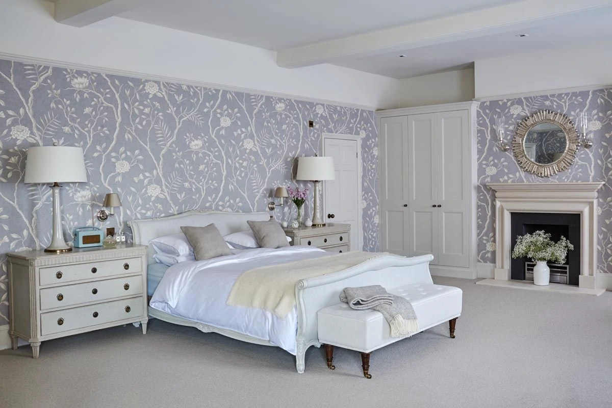 a beautiful white bed room